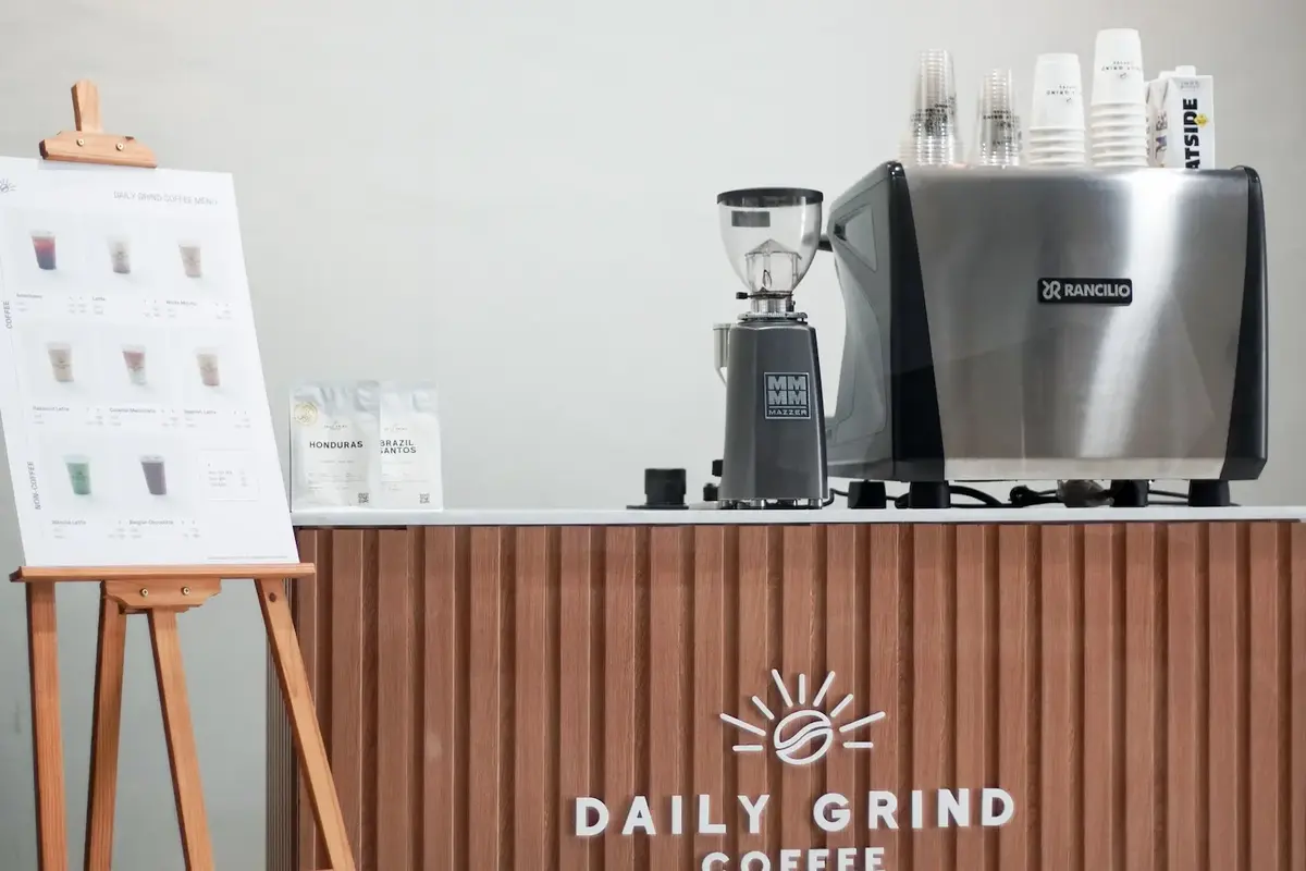 Daily Grind mobile coffee cart with espresso machine and grinder